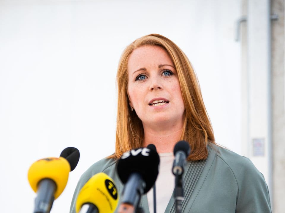 Annie Lööf at a press conference with microphones